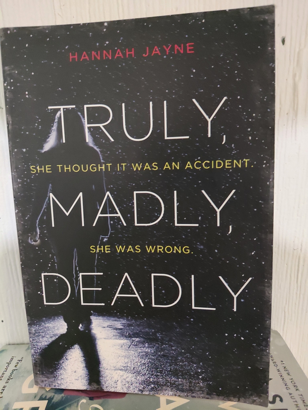 Truly, Madly, Deadly by Hannah Jayne - Black Cover with Yellow & White Text